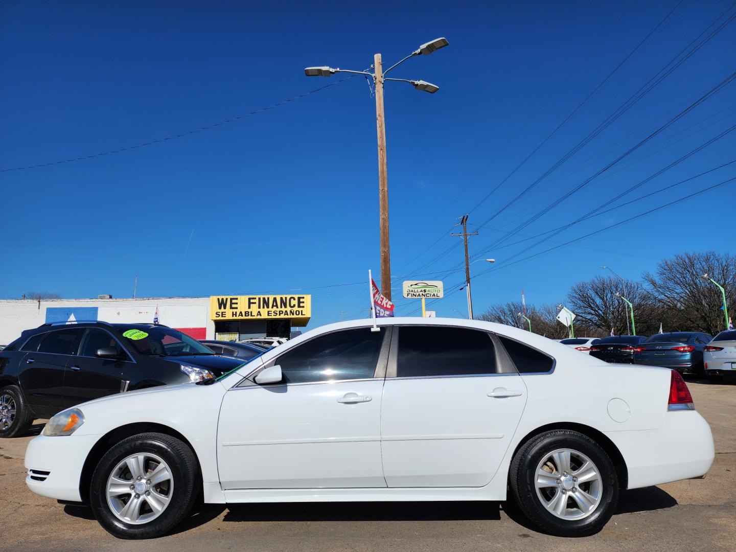 2013 WHITE Chevrolet Impala LS (2G1WF5E35D1) , AUTO transmission, located at 2660 S.Garland Avenue, Garland, TX, 75041, (469) 298-3118, 32.885551, -96.655602 - Welcome to DallasAutos4Less, one of the Premier BUY HERE PAY HERE Dealers in the North Dallas Area. We specialize in financing to people with NO CREDIT or BAD CREDIT. We need proof of income, proof of residence, and a ID. Come buy your new car from us today!! This is a very well cared for 2013 CH - Photo#6